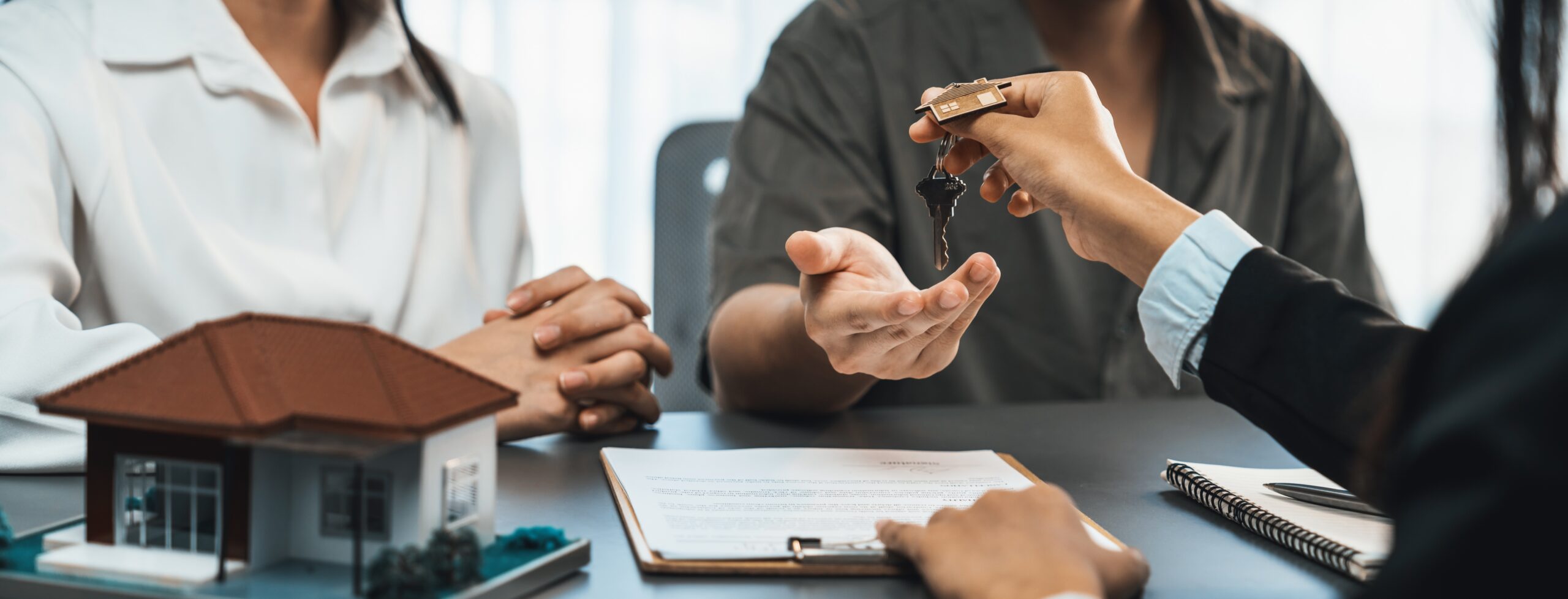 real estate agent hand house key buyer prodigy scaled real estate agent hand house key buyer prodigy scaled