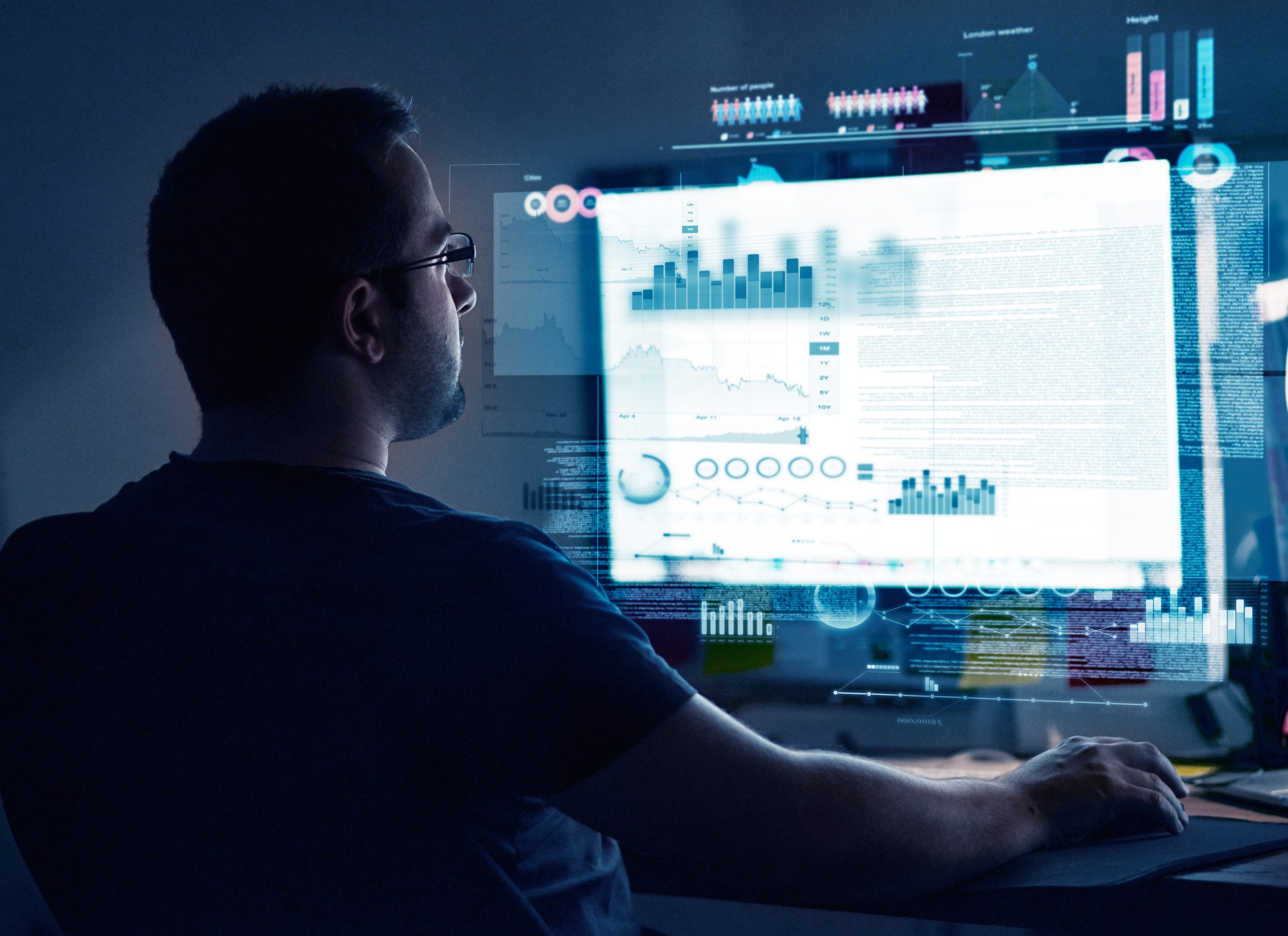 Cropped shot of a young computer programmer looking through data.